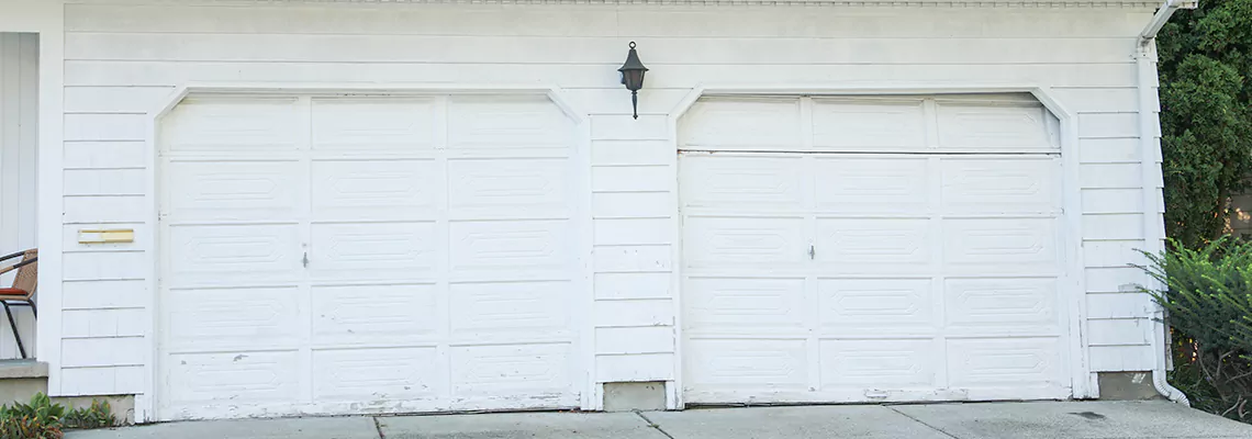 Roller Garage Door Dropped Down Replacement in Sarasota, FL