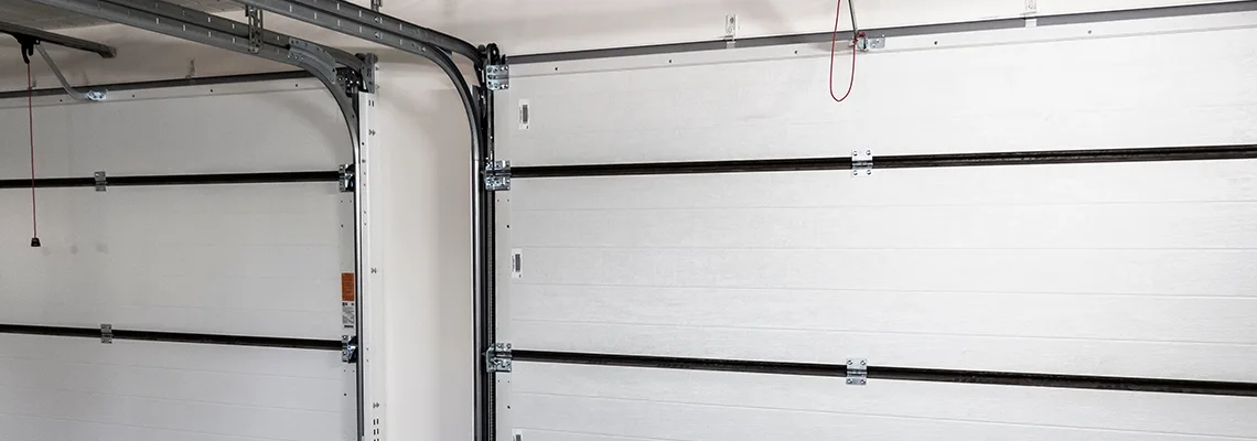 Fix Folding Garage Door Jerking in Sarasota, Florida