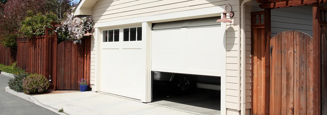 Fix Metal Garage Door Jerking in Sarasota, Florida